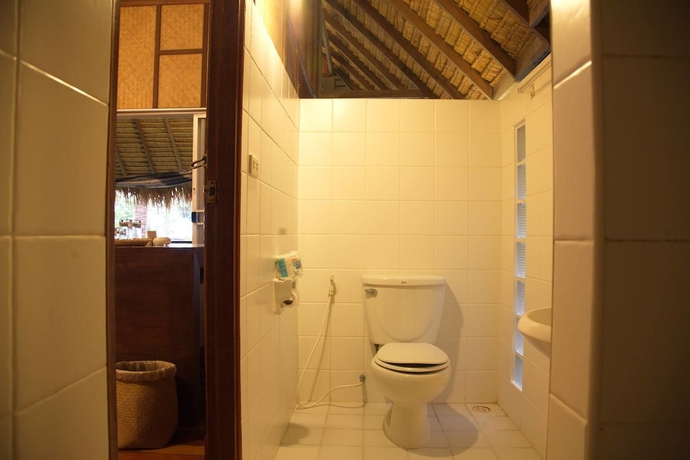 Imagen de la habitación del Hotel The Narima Bungalow Resort. Foto 13
