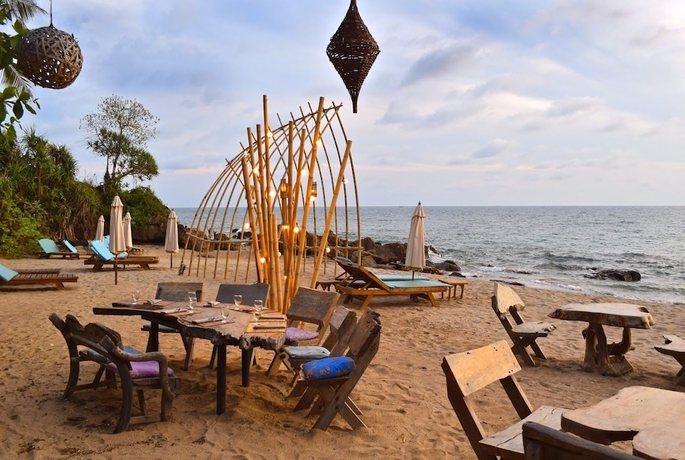 Imagen del bar/restaurante del Hotel The Narima Bungalow Resort. Foto 5
