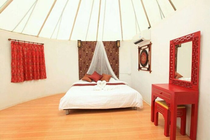 Imagen de la habitación del Hotel The Natural Yurt Resort At Khao Kho. Foto 15