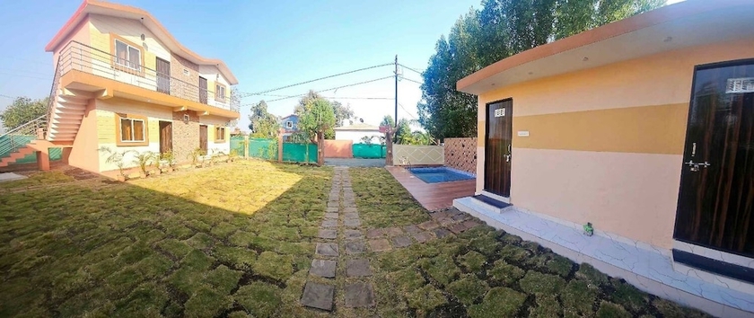 Imagen de la habitación del Hotel The Nature Nest And Resort. Foto 6