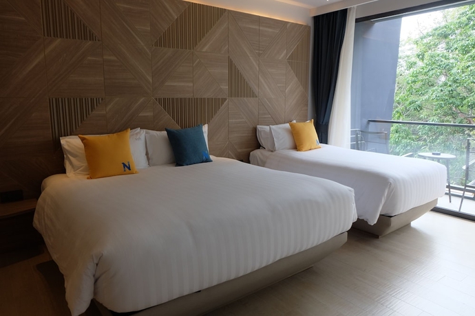 Imagen de la habitación del Hotel The Nature Phuket. Foto 11