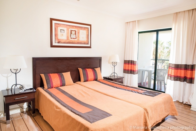 Imagen de la habitación del Hotel The Navigator- Palm Oasis Alvor. Foto 11