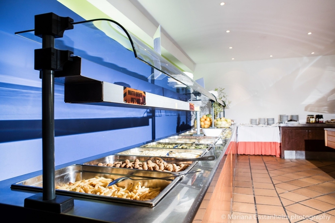 Imagen del bar/restaurante del Hotel The Navigator- Palm Oasis Alvor. Foto 3