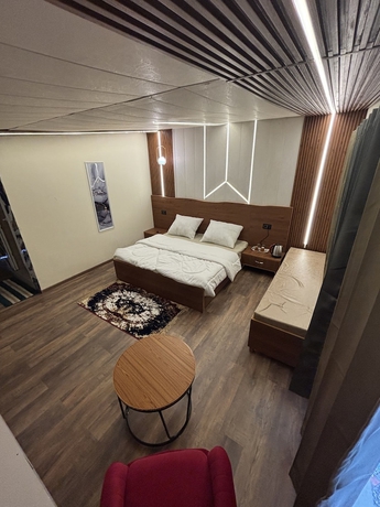 Imagen de la habitación del Hotel The Nawalam Swiss Resort. Foto 6