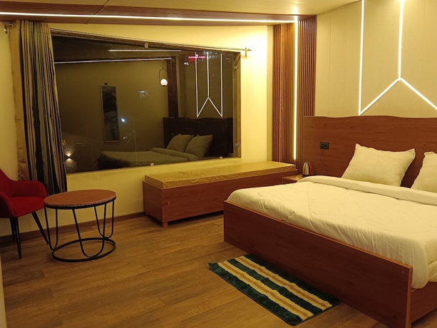 Imagen de la habitación del Hotel The Nawalam Swiss Resort. Foto 7