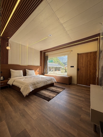 Imagen de la habitación del Hotel The Nawalam Swiss Resort. Foto 13
