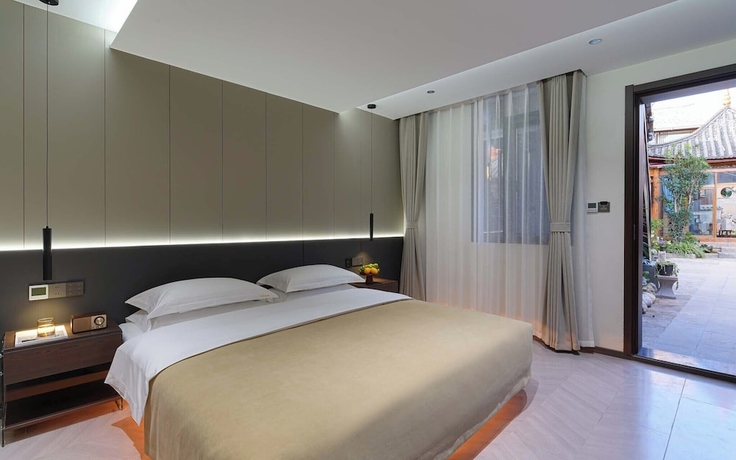 Imagen de la habitación del Hotel The Naxi Hereditary Courtyard - Chinese Nature\'s Design Retreat - Free Pick-up from Airport for 3 N. Foto 16