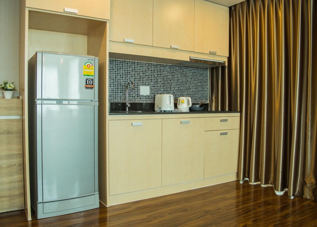 Imagen de los interiores del Hotel The Near Residence - Sriracha. Foto 4
