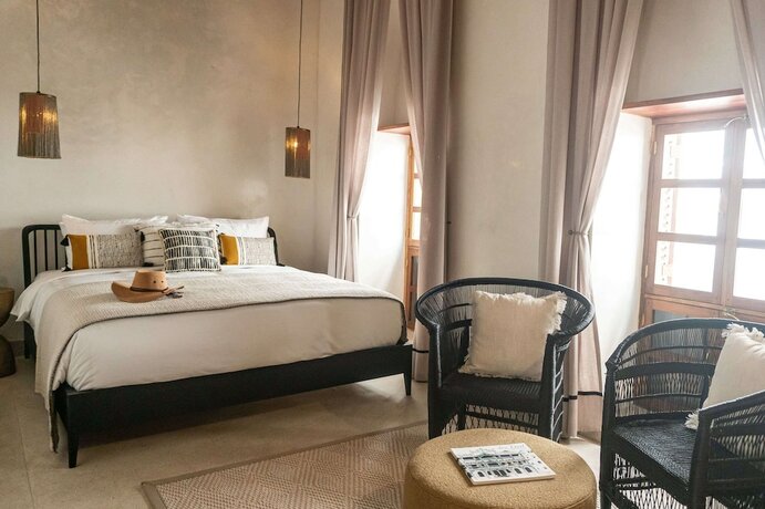 Imagen de la habitación del Hotel The Neela Boutique Stone Town. Foto 18