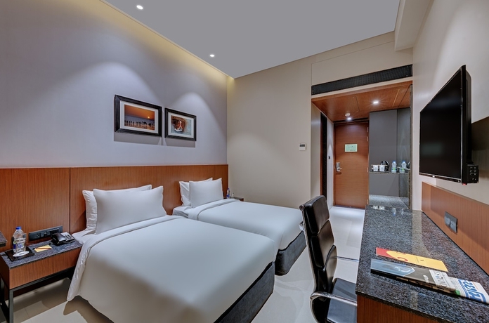 Imagen de la habitación del Hotel The Neemaya. Foto 7