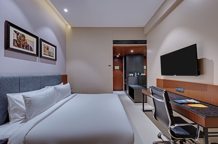 Imagen de la habitación del Hotel The Neemaya. Foto 8