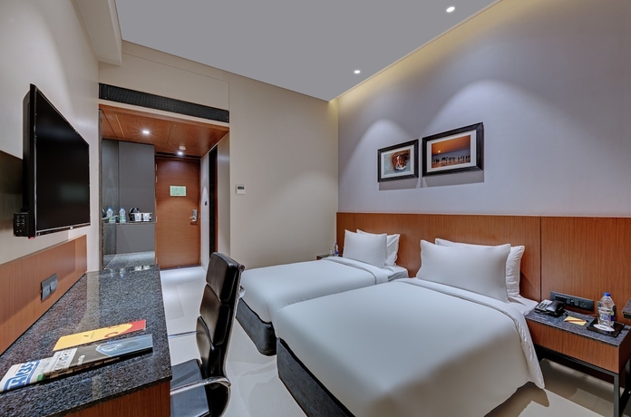 Imagen de la habitación del Hotel The Neemaya. Foto 10