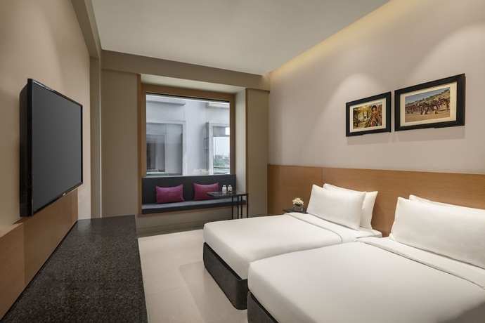 Imagen de la habitación del Hotel The Neemaya. Foto 11