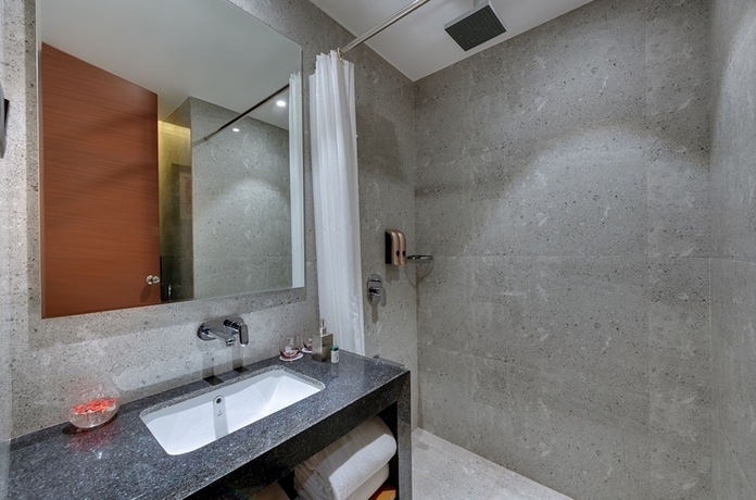 Imagen de la habitación del Hotel The Neemaya. Foto 12