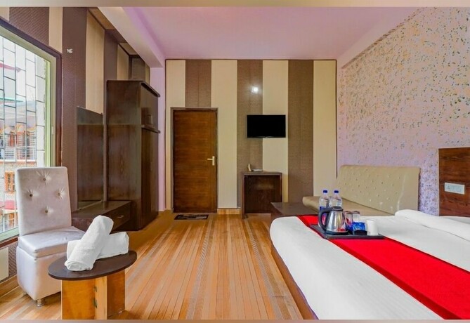 Imagen de la habitación del Hotel The Neer Budha. Foto 8