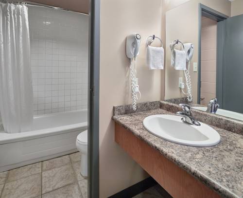 Imagen de la habitación del Hotel The Neighbourhood Inn Express. Foto 4