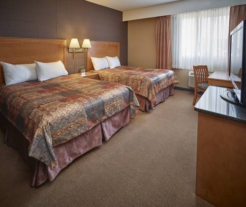 Imagen de la habitación del Hotel The Neighbourhood Inn Express. Foto 5