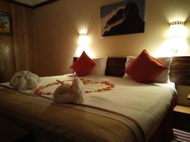 Imagen de la habitación del Hotel The Nelion. Foto 14