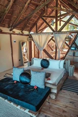 Imagen de la habitación del Hotel The Nest Boutique. Foto 10