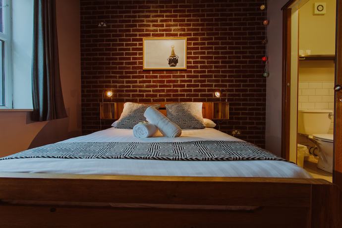 Imagen de la habitación del Hotel The Nest Boutique Hostel. Foto 3