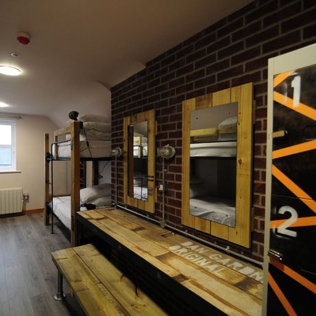 Imagen de la habitación del Hotel The Nest Boutique Hostel. Foto 11