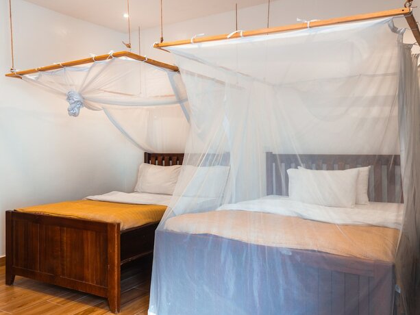 Imagen de la habitación del Hotel The Nest Rugando. Foto 14