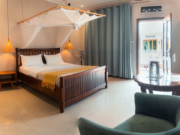 Imagen de la habitación del Hotel The Nest Rugando. Foto 15
