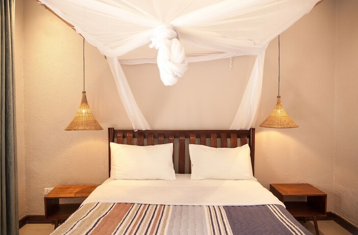 Imagen de la habitación del Hotel The Nest Rugando. Foto 17
