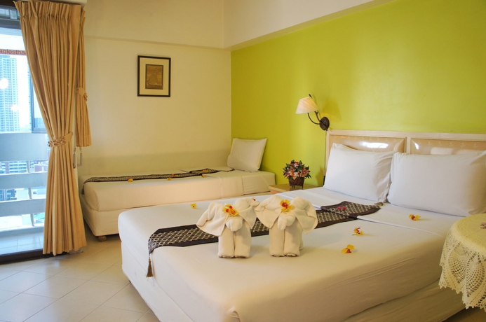 Imagen de la habitación del Hotel The Nest Serviced Apartment. Foto 6