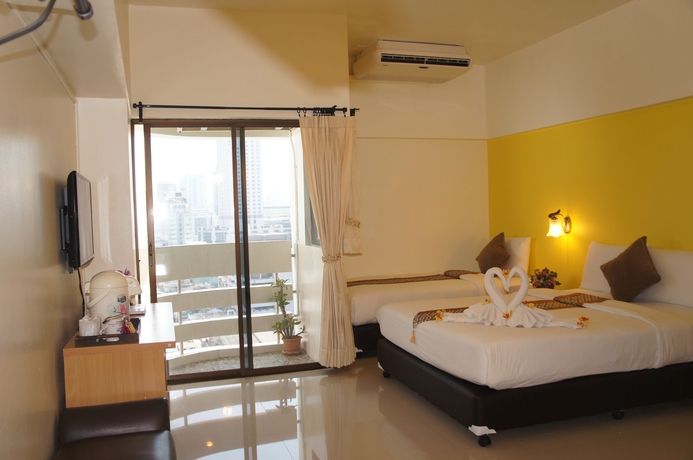 Imagen de la habitación del Hotel The Nest Serviced Apartment. Foto 7