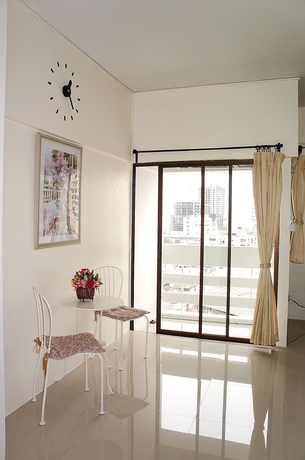 Imagen de la habitación del Hotel The Nest Serviced Apartment. Foto 11
