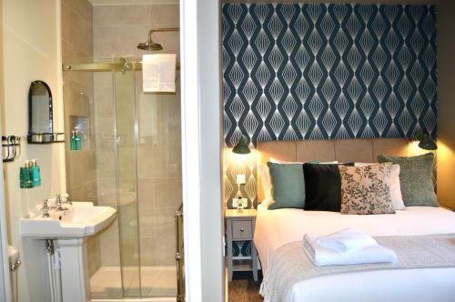 Imagen de la habitación del Hotel The Nest & Restaurant. Foto 16