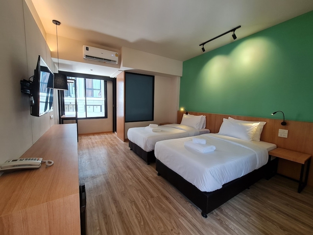 Imagen de la habitación del Hotel The Neuf Ratchada. Foto 11