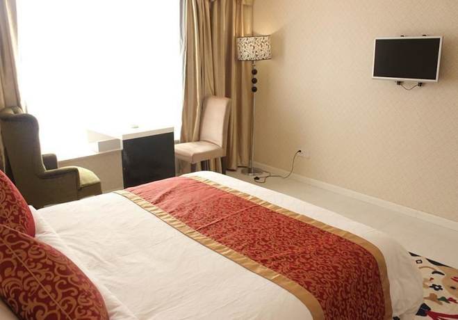 Imagen de la habitación del Hotel The New Dongyuan International. Foto 3