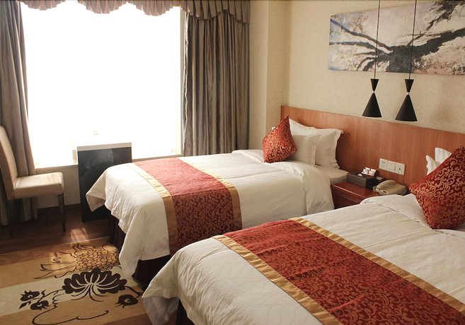 Imagen de la habitación del Hotel The New Dongyuan International. Foto 10