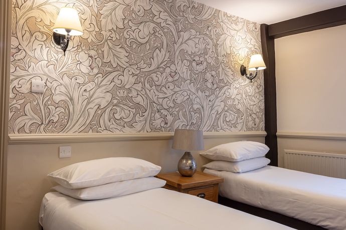 Imagen de la habitación del Hotel The New Inn. Foto 6