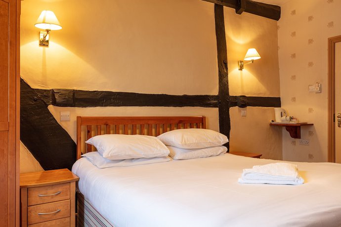 Imagen de la habitación del Hotel The New Inn. Foto 10