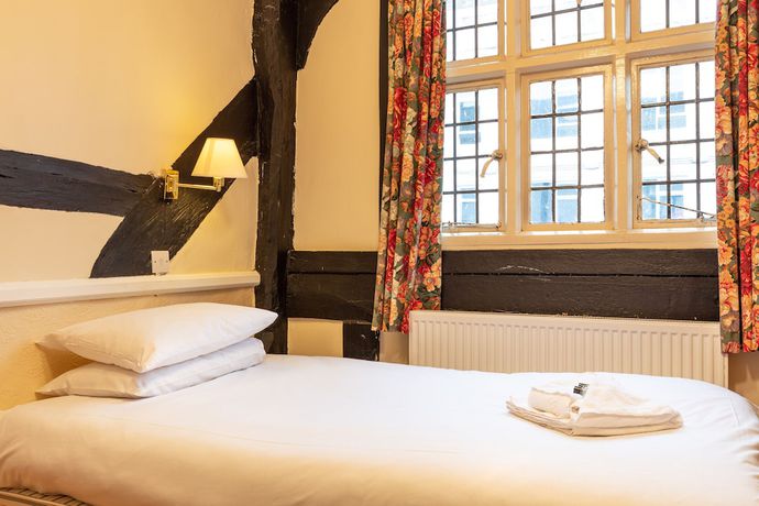 Imagen de la habitación del Hotel The New Inn. Foto 13