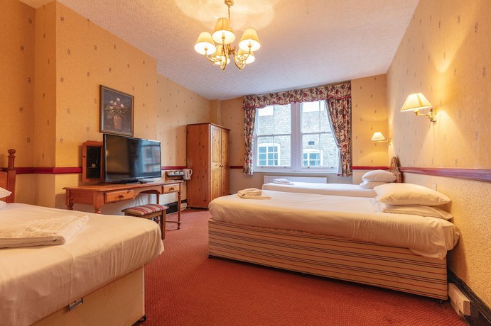 Imagen de la habitación del Hotel The New Inn. Foto 14