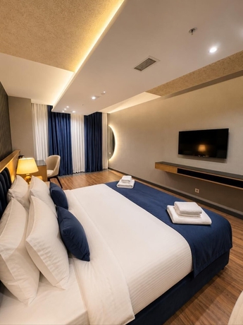 Imagen de la habitación del Hotel The New Jai Son. Foto 5