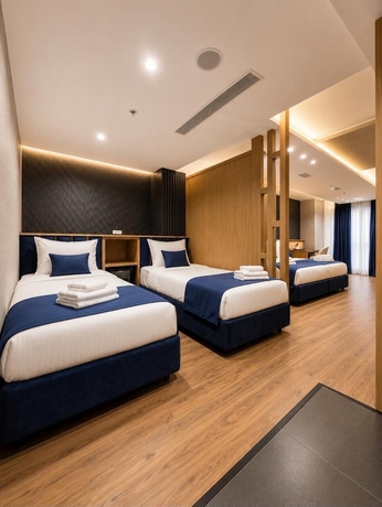 Imagen de la habitación del Hotel The New Jai Son. Foto 6