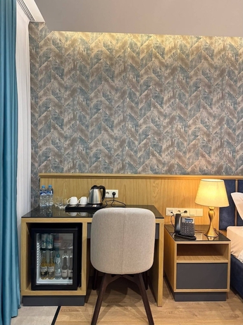 Imagen de la habitación del Hotel The New Jai Son. Foto 7