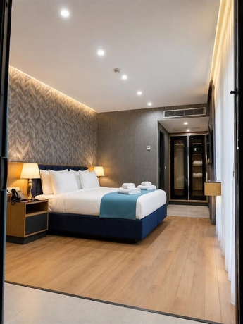 Imagen de la habitación del Hotel The New Jai Son. Foto 14