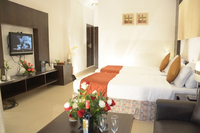 Imagen de la habitación del Hotel The New Marrion. Foto 6