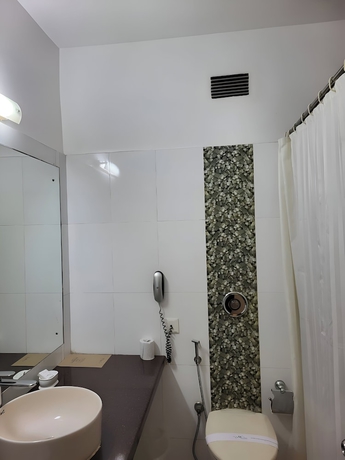 Imagen de la habitación del Hotel The New Marrion. Foto 11