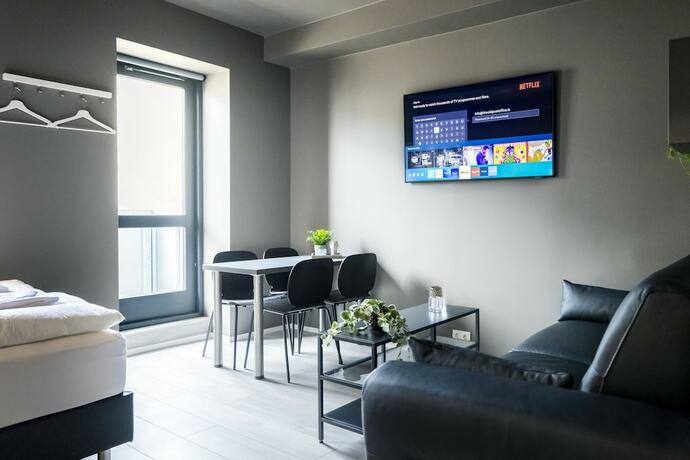 Imagen de la habitación del Hotel The New Post Office. Foto 5