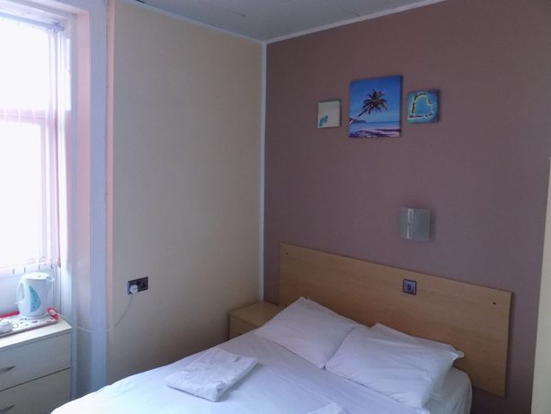 Imagen de la habitación del Hotel The New Royal Windsor. Foto 2