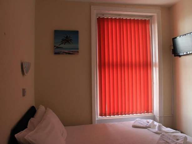 Imagen de la habitación del Hotel The New Royal Windsor. Foto 8