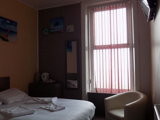 Imagen de la habitación del Hotel The New Royal Windsor. Foto 9