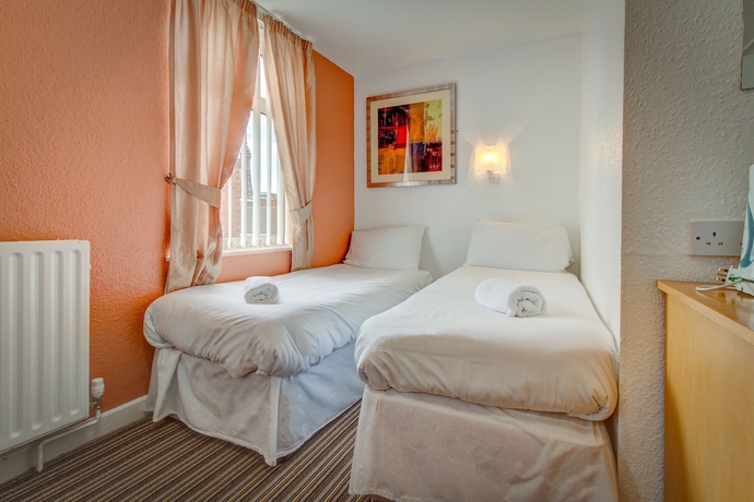 Imagen de la habitación del Hotel The New Sandringham Court. Foto 4
